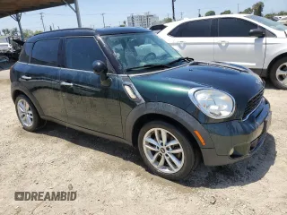 2012 MINI Countryman S with VIN WMWZC3C58CWL83403, listed as a Copart auction lot 61290125 with 122,714 mi miles and Clean title. Bid and sale history available at DreamBid. Image 4.
