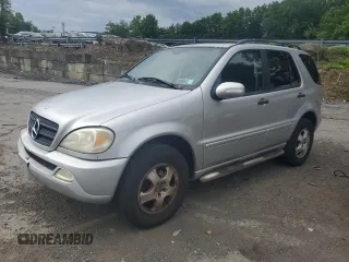 2003 Mercedes-Benz M 320 with VIN 4JGAB54E13A371972, listed as a Copart auction lot 65198495 with 133,635 mi miles and Salvage title. Bid and sale history available at DreamBid. Image 1.