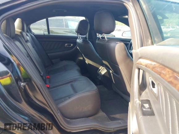 2014 Ford Taurus Limited with VIN 1FAHP2F86EG163392, listed as a IAAI auction lot 42538336 with 131,910 mi miles and . Bid and sale history available at DreamBid. Image 8.
