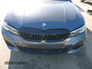 2021 BMW 3 Series 330i z VIN 3MW5R1J08M8B94401, wystawiony jako IAAI lot #41760747 z przebiegiem Nie podano mil oraz . Historia ofert i sprzedaży dostępna na DreamBid. Obrazek 12.