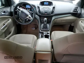 2013 Ford Escape SE with VIN 1FMCU9GX7DUA24721, listed as a Copart auction lot 54543385 with 203,036 mi miles and Salvage title. Bid and sale history available at DreamBid. Image 8.