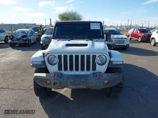 2022 Jeep Gladiator Mojave with VIN 1C6JJTEG6NL100383, listed as a IAAI auction lot 40712989 with 35,283 mi miles. Bid and sale history available at carsss.com. Image 12.