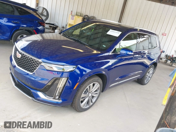 2025 Cadillac XT6 FWD Premium Luxury with VIN 1GYKPCRS5SZ119357, listed as a IAAI auction lot 42087218 with 11,352 mi miles. Bid and sale history available at carsss.com. Image 20.