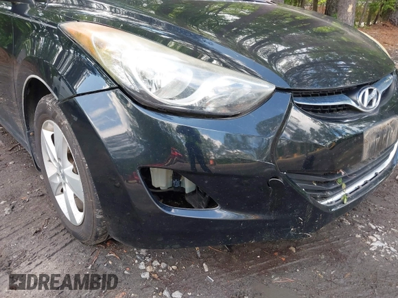 2013 Hyundai Elantra GLS z VIN KMHDH4AE0DU545363, wystawiony jako IAAI lot #42281675 z przebiegiem 129 249 mil mil oraz . Historia ofert i sprzedaży dostępna na DreamBid. Obrazek 6.