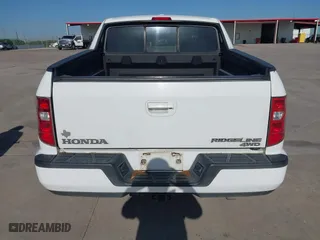2010 Honda Ridgeline RTL with VIN 5FPYK1F54AB011339, listed as a IAAI auction lot 41983918 with 201,124 mi miles. Bid and sale history available at carsss.com. Image 16.