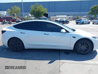 2025 Tesla Model 3 Long Range with VIN 5YJ3E1EB3SF914858, listed as a IAAI auction lot 42719707 with 5,849 mi miles and . Bid and sale history available at DreamBid. Image 14.