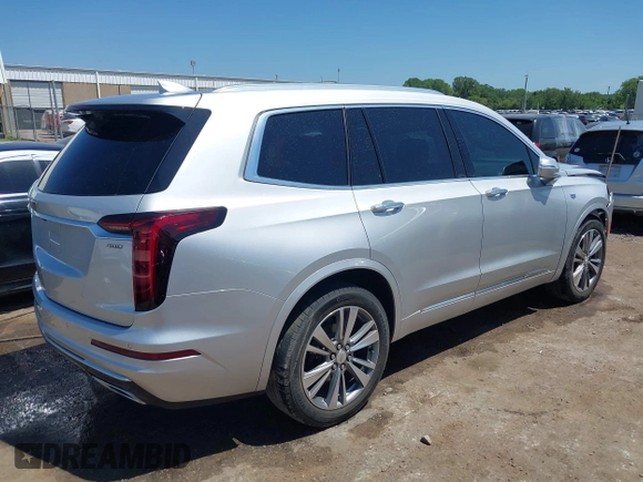 2020 Cadillac XT6 FWD Premium Luxury with VIN 1GYKPCRS1LZ188645, listed as a IAAI auction lot 40128169 with 39,957 mi miles. Bid and sale history available at carsss.com. Image 4.