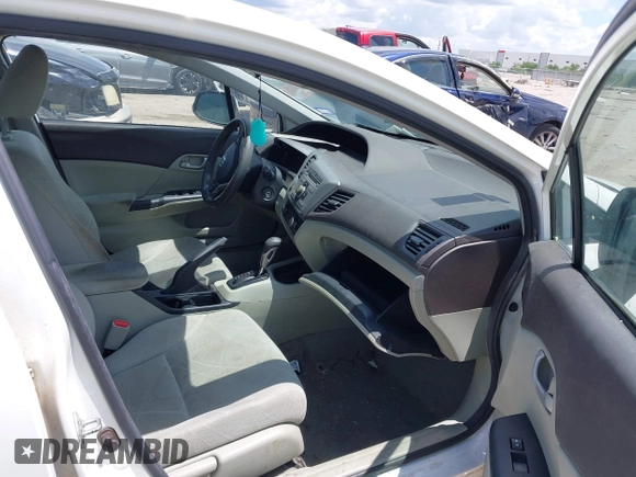2012 Honda Civic LX z VIN 2HGFB2F57CH536142, wystawiony jako IAAI lot #42194088 z przebiegiem 108 293 mil mil oraz . Historia ofert i sprzedaży dostępna na DreamBid. Obrazek 5.