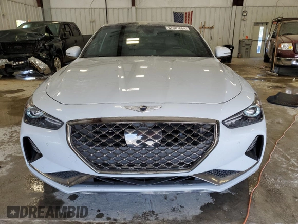 2020 Genesis G70 3.3T with VIN KMTG34LE6LU048573, listed as a Copart auction lot 67907884 with 63,531 mi miles and Salvage Title. Bid and sale history available at carsss.com. Image 5.