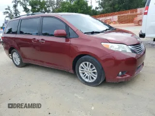 2015 Toyota Sienna XLE with VIN 5TDYK3DC4FS643881, listed as a Copart auction lot 56684635 with 137,781 mi miles and Salvage Title. Bid and sale history available at DreamBid. Image 4.