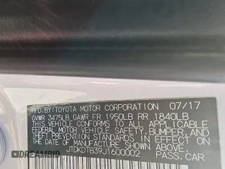 2018 Toyota Prius One z VIN JTDKDTB39J1600002, wystawiony jako Copart lot #53493975 z przebiegiem 87 147 mil mil oraz Czysty tytuł • Clean title. Historia ofert i sprzedaży dostępna na DreamBid. Obrazek 13.
