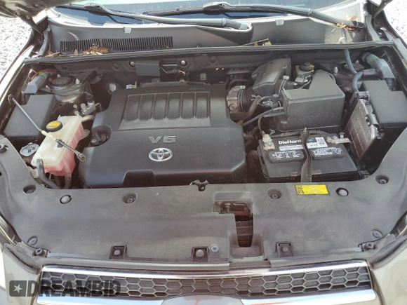 2010 Toyota RAV4 Limited with VIN JTMYK4DVXAD003329, listed as a Copart auction lot 60216955 with 97,372 mi miles and Salvage title. Bid and sale history available at DreamBid. Image 12.