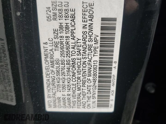 2025 Honda Pilot EX-L with VIN 5FNYG2H48SB006313, listed as a Copart auction lot 82039054 with 10,402 mi miles and Salvage Title. Bid and sale history available at carsss.com. Image 15.