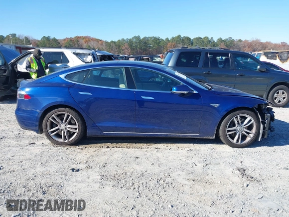 2016 Tesla Model S 90D with VIN 5YJSA1E25GF144614, listed as a IAAI auction lot 40941311 with 83,587 mi miles and . Bid and sale history available at DreamBid. Image 12.