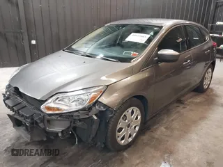 2012 Ford Focus SE with VIN 1FAHP3K22CL394088, listed as a IAAI auction lot 40953085 with 147,259 mi miles and . Bid and sale history available at carsss.com. Image 19.