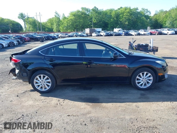 2012 Mazda 6 i Touring with VIN 1YVHZ8DH2C5M23669, listed as a IAAI auction lot 42247758 with 123,389 mi miles and . Bid and sale history available at DreamBid. Image 13.