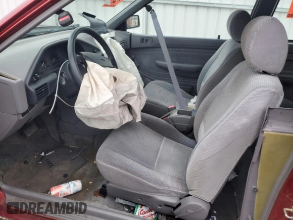 1996 Ford Escort z VIN 3FASP11J6TR151727, wystawiony jako Copart lot #55487725 z przebiegiem 118 276 mil mil oraz Nie do naprawy. Historia ofert i sprzedaży dostępna na DreamBid. Obrazek 7.