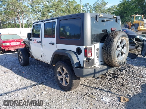2013 Jeep Wrangler Unlimited Sport RHD with VIN 1C4BJWKG2DL642078, listed as a IAAI auction lot 42134649 with Not provided miles and . Bid and sale history available at DreamBid. Image 3.