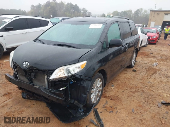 2012 Toyota Sienna XLE with VIN 5TDDK3DC3CS030466, listed as a IAAI auction lot 41914368 with 174,512 mi miles. Bid and sale history available at carsss.com. Image 2.