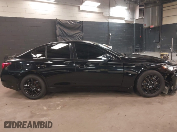 2014 Infiniti Q50 Sport with VIN JN1BV7AR0EM704993, listed as a IAAI auction lot 42492764 with 64,811 mi miles and . Bid and sale history available at DreamBid. Image 13.