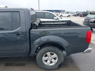 2012 Nissan Frontier SV z VIN 1N6AD0ER4CC402085, wystawiony jako IAAI lot #41975832 z przebiegiem 263 152 mil mil oraz . Historia ofert i sprzedaży dostępna na DreamBid. Obrazek 6.