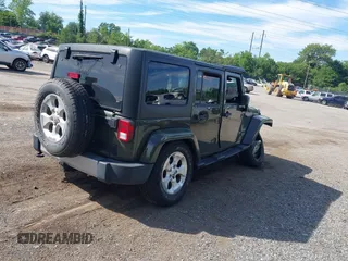 2015 Jeep Wrangler Unlimited Altitude z VIN 1C4HJWEG0FL752152, wystawiony jako IAAI lot #42311043 z przebiegiem 112 379 mil mil oraz . Historia ofert i sprzedaży dostępna na DreamBid. Obrazek 4.