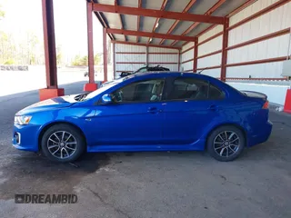 2017 Mitsubishi Lancer ES with VIN JA32V2FW5HU004856, listed as a IAAI auction lot 41950912 with 74,890 mi miles. Bid and sale history available at carsss.com. Image 14.