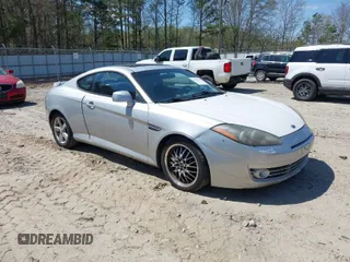 2008 Hyundai Tiburon GT z VIN KMHHN66F98U294081, wystawiony jako IAAI lot #41879165 z przebiegiem 205 253 mil mil oraz . Historia ofert i sprzedaży dostępna na DreamBid. Obrazek 1.