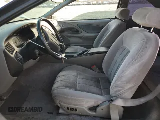 1997 Ford Thunderbird LX with VIN 1FALP62W4VH170423, listed as a Copart auction lot 83379614 with 93,117 mi miles and Salvage Title. Bid and sale history available at DreamBid. Image 7.