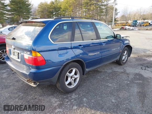 2001 BMW X5 4.4i with VIN WBAFB33501LH24719, listed as a IAAI auction lot 41055076 with 126,530 mi miles. Bid and sale history available at carsss.com. Image 4.