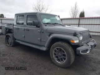 2022 Jeep Gladiator High Altitude with VIN 1C6HJTFG4NL131029, listed as a IAAI auction lot 41789060 with 50,347 mi miles and . Bid and sale history available at DreamBid. Image 1.