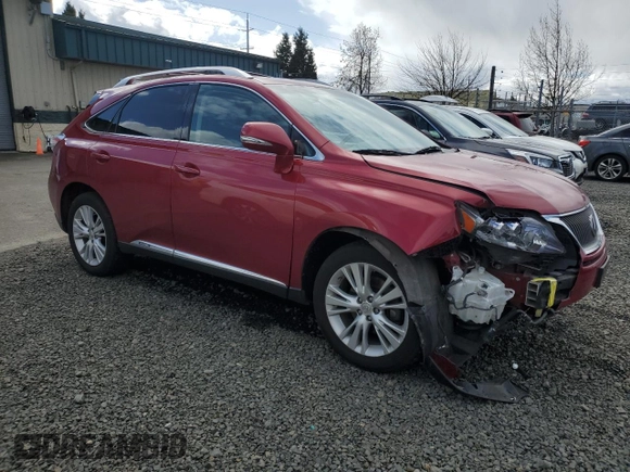 2010 Lexus RX 450h with VIN JTJBC1BAXA2403465, listed as a Copart auction lot 51248335 with 128,932 mi miles and Salvage Title. Bid and sale history available at DreamBid. Image 4.