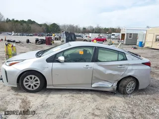 2021 Toyota Prius L Eco with VIN JTDKAMFU1M3152848, listed as a IAAI auction lot 41600212 with 140,114 mi miles. Bid and sale history available at carsss.com. Image 13.
