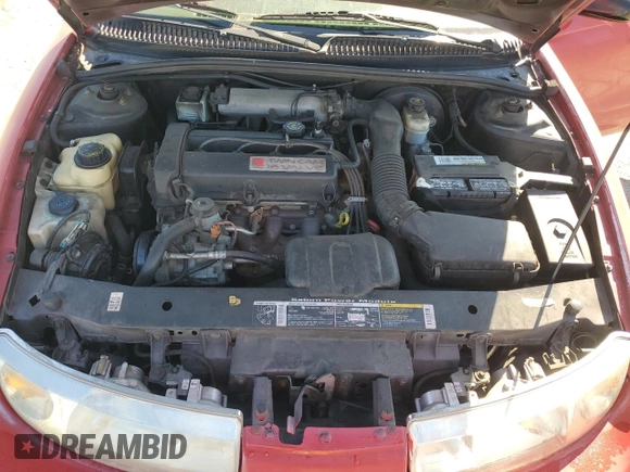 1999 Saturn SC z VIN 1G8ZY127XXZ314531, wystawiony jako Copart lot #49653805 z przebiegiem 130 457 mil mil oraz Szkody całkowita. Historia ofert i sprzedaży dostępna na DreamBid. Obrazek 11.