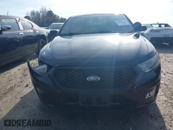2014 Ford Police Interceptor with VIN 1FAHP2MK0EG148689, listed as a IAAI auction lot 41057241 with 124,703 mi miles and . Bid and sale history available at DreamBid. Image 12.