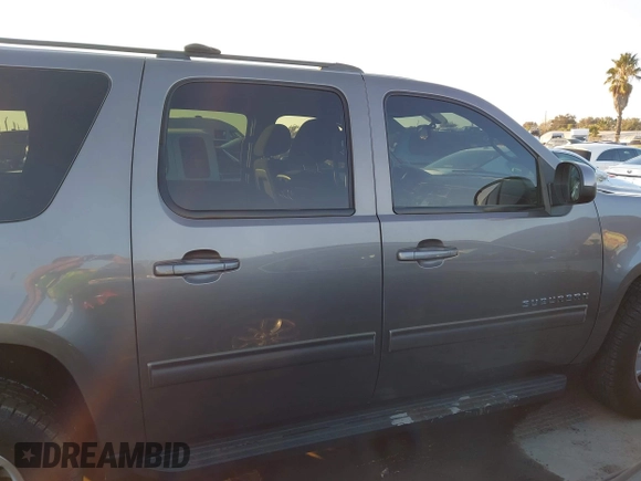 2012 Chevrolet Suburban LS with VIN 1GNSCHE0XCR143178, listed as a IAAI auction lot 41447363 with 96,197 mi miles. Bid and sale history available at carsss.com. Image 13.