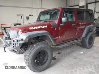 2008 Jeep Wrangler Rubicon z VIN 1J8GA69178L630840, wystawiony jako IAAI lot #42483010 z przebiegiem 145 196 mil mil oraz . Historia ofert i sprzedaży dostępna na DreamBid. Obrazek 2.