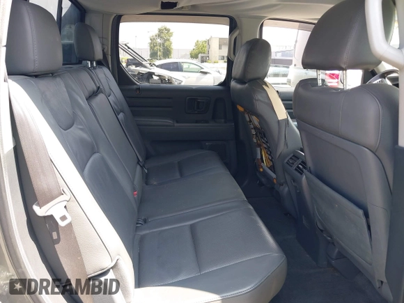 2007 Honda Ridgeline RTL with VIN 2HJYK16547H502601, listed as a IAAI auction lot 42484634 with 197,253 mi miles and . Bid and sale history available at DreamBid. Image 8.