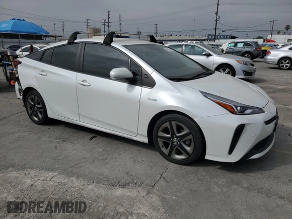 2021 Toyota Prius L Eco with VIN JTDKAMFUXM3149396, listed as a Copart auction lot 61874195 with 126,473 mi miles and Salvage title. Bid and sale history available at DreamBid. Image 4.
