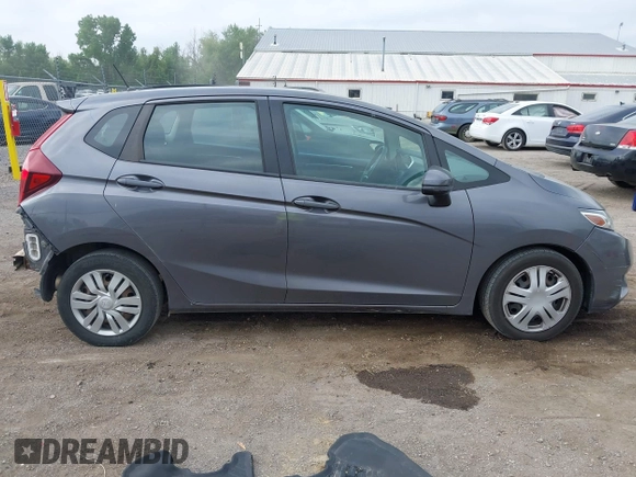 2015 Honda Fit LX with VIN 3HGGK5H58FM722880, listed as a IAAI auction lot 42276261 with 104,886 mi miles and . Bid and sale history available at DreamBid. Image 13.