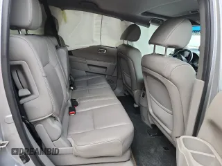 2013 Honda Pilot EX-L z VIN 5FNYF3H70DB040607, wystawiony jako Copart lot #61561005 z przebiegiem 200 454 mil mil oraz Czysty tytuł • Clean title. Historia ofert i sprzedaży dostępna na DreamBid. Obrazek 11.