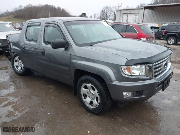 2012 Honda Ridgeline RT with VIN 5FPYK1F24CB456298, listed as a IAAI auction lot 40869948 with 123,329 mi miles. Bid and sale history available at carsss.com. Image 1.