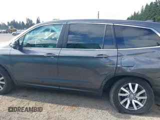 2019 Honda Pilot EX-L with VIN 5FNYF6H52KB035504, listed as a IAAI auction lot 42642735 with 54,736 mi miles and . Bid and sale history available at DreamBid. Image 14.