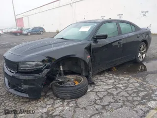 2015 Dodge Charger RT with VIN 2C3CDXCTXFH732483, listed as a IAAI auction lot 41037351 with 89,805 mi miles. Bid and sale history available at carsss.com. Image 2.