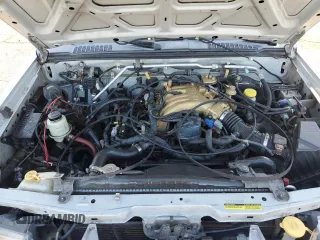 2000 Nissan Frontier XE with VIN 1N6ED26T1YC327635, listed as a Copart auction lot 43149525 with 922,578 mi miles and Salvage title. Bid and sale history available at DreamBid. Image 11.