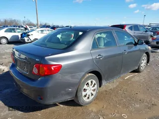 2009 Toyota Corolla with VIN JTDBL40E499070662, listed as a IAAI auction lot 41590923 with 148,295 mi miles. Bid and sale history available at carsss.com. Image 4.