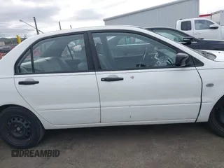 2004 Mitsubishi Lancer ES with VIN JA3AJ26E74U060371, listed as a IAAI auction lot 41636927 with 165,456 mi miles. Bid and sale history available at carsss.com. Image 13.