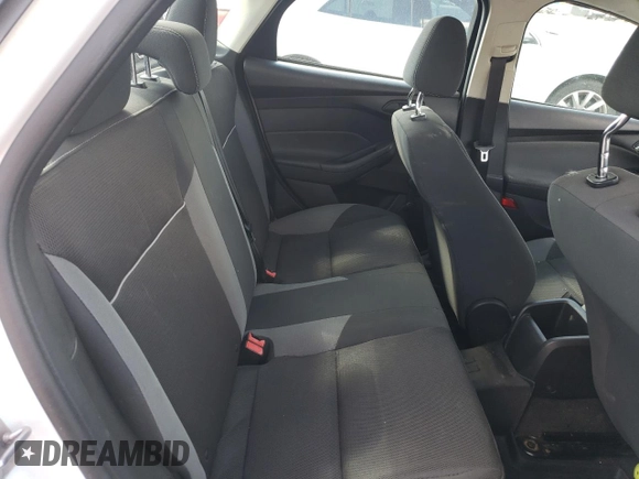 2013 Ford Focus S with VIN 1FADP3E2XDL326410, listed as a Copart auction lot 73015994 with 65,900 mi miles and Salvage Title. Bid and sale history available at carsss.com. Image 10.