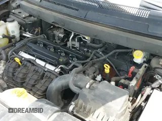 2012 Dodge Journey SE z VIN 3C4PDCAB5CT275973, wystawiony jako IAAI lot #42631803 z przebiegiem 120 440 mil mil oraz . Historia ofert i sprzedaży dostępna na DreamBid. Obrazek 13.