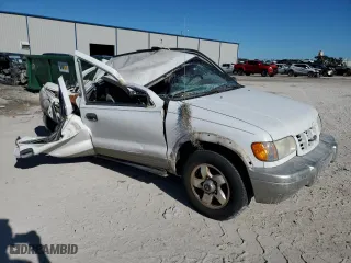 1998 Kia Sportage with VIN KNDJB7232W5569054, listed as a Copart auction lot 82756824 with 106,550 mi miles and Salvage Title. Bid and sale history available at carsss.com. Image 4.